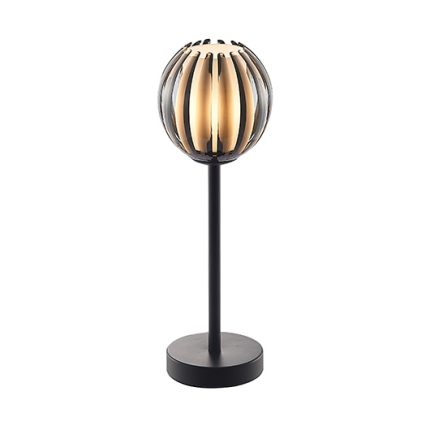 Bordslampa med fot i svart metall och en skärm i rökfärgad akryl